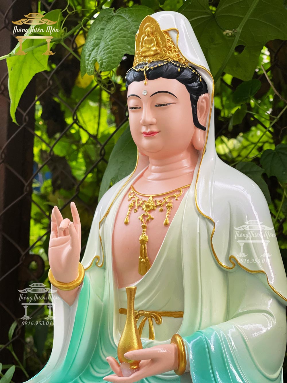 Tượng Quan Âm ngồi đá, phối màu xanh, kích thước 48cm